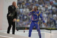 Dr. Dre, left, and Snoop Dogg perform during halftime of the NFL Super Bowl 56 football game between the Los Angeles Rams and the Cincinnati Bengals Sunday, Feb. 13, 2022, in Inglewood, Calif. (AP Photo/Marcio Jose Sanchez)