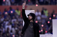Eminem performs during halftime of the NFL Super Bowl 56 football game between the Los Angeles Rams and the Cincinnati Bengals, Sunday, Feb. 13, 2022, in Inglewood, Calif. (AP Photo/Elaine Thompson)