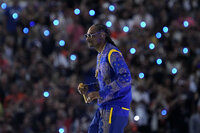 Snoop Dogg performs during halftime of the NFL Super Bowl 56 football game between the Cincinnati Bengals and the Los Angeles Rams Sunday, Feb. 13, 2022, in Inglewood, Calif. (AP Photo/Julio Cortez)