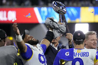 Los Angeles Rams defensive end Aaron Donald (99) after the NFL Super Bowl 56 football game Sunday, Feb. 13, 2022, in Inglewood, Calif. The Los Angeles Rams won 23-20. (AP Photo/Julio Cortez)