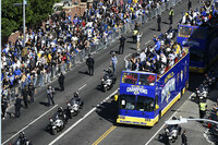 Los Angeles Rams offensive lineman Andrew Whitworth holds up the Vince Lombardi Super Bowl trophy during the team's victory parade in Los Angeles, Wednesday, Feb. 16, 2022, following their win Sunday over the Cincinnati Bengals in the NFL Super Bowl 56 football game. (AP Photo/Kyusung Gong)