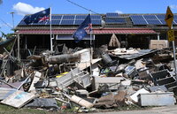 Ipswich (Australia), 08/03/2022.- Members of the ADF (Australian Defence Force) are seen helping in the clean up of flood affected properties in the suburb of Goodna in Ipswich, Queensland, Australia, 08 March 2022. Queensland is looking at a damage bill of more than 2.5 billion Australian dollar (around 1.687 billion euro) following the flood disaster that has claimed 13 lives. (Inundaciones) EFE/EPA/DARREN ENGLAND AUSTRALIA AND NEW ZEALAND OUT