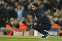 Sporting's Paulinho , center left, reacts after Manchester City's goalkeeper Ederson saved his shot during the Champions League round of 16 second leg soccer match between Manchester City and Sporting Lisbon at the City of Manchester Stadium in Manchester, England, Wednesday, March 9, 2022. (AP Photo/Dave Thompson)