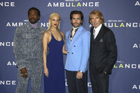 Yahya Abdul-Mateen II, from left, Eiza Gonzalez, Jake Gyllenhaal and Michael Bay pose for photographers upon arrival at the premiere of the film 'Ambulance' in London Wednesday, March 23, 2022. (Photo by Joel C Ryan/Invision/AP)