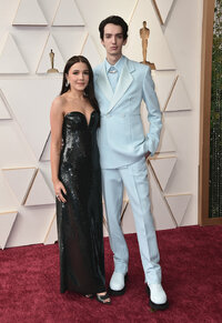 Rebecca Phillipou, left, and Kodi Smit-McPhee arrive at the Oscars on Sunday, March 27, 2022, at the Dolby Theatre in Los Angeles. (Photo by Jordan Strauss/Invision/AP)