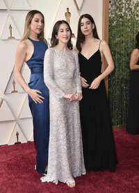 Este Haim, from left, Alana Haim, and Danielle Haim arrive at the Oscars on Sunday, March 27, 2022, at the Dolby Theatre in Los Angeles. (Photo by Jordan Strauss/Invision/AP)