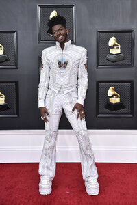 Lil Nas X arrives at the 64th Annual Grammy Awards at the MGM Grand Garden Arena on Sunday, April 3, 2022, in Las Vegas. (Photo by Jordan Strauss/Invision/AP)