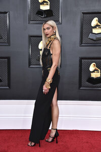 Dua Lipa arrives at the 64th Annual Grammy Awards at the MGM Grand Garden Arena on Sunday, April 3, 2022, in Las Vegas. (Photo by Jordan Strauss/Invision/AP)