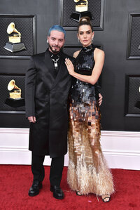 J Balvin, left, and Valentina Ferrer arrive at the 64th Annual Grammy Awards at the MGM Grand Garden Arena on Sunday, April 3, 2022, in Las Vegas. (Photo by Jordan Strauss/Invision/AP)