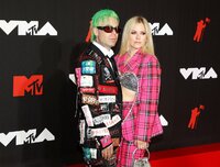 Avril Lavigne, left, and Mod Sun arrive at the iHeartRadio Music Awards on Tuesday, March 22, 2022, at the Shrine Auditorium in Los Angeles. (Photo by Jordan Strauss/Invision/AP)