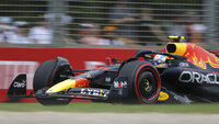 Spectators watch the Australian Formula One Grand Prix in Melbourne, Australia, Sunday, April 10, 2022. (AP Photo/Asanka Brendon Ratnayake)