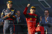 Spectators watch the trophy presentation at the Australian Formula One Grand Prix in Melbourne, Australia, Sunday, April 10, 2022. (AP Photo/Asanka Brendon Ratnayake)