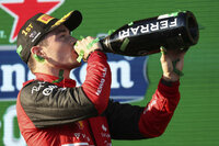 Ferrari driver Charles Leclerc of Monaco reacts after winning the Australian Formula One Grand Prix in Melbourne, Australia, Sunday, April 10, 2022. (AP Photo/Asanka Brendon Ratnayake)