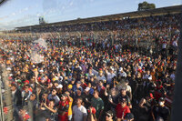 Spectators watch the Australian Formula One Grand Prix in Melbourne, Australia, Sunday, April 10, 2022. (AP Photo/Asanka Brendon Ratnayake)