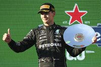 Ferrari driver Charles Leclerc of Monaco reacts after winning the Australian Formula One Grand Prix in Melbourne, Australia, Sunday, April 10, 2022. (AP Photo/Asanka Brendon Ratnayake)