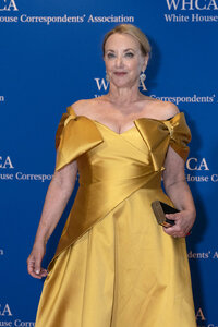 Actor J. Smith-Cameron poses for photographers as she arrives to the annual White House Correspondents' Association Dinner in Washington, Saturday, April 30, 2022. (AP Photo/Jose Luis Magana)
