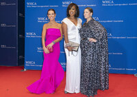 Stephanie Ruhle, Gayle King and Drew Barrymore poses for photographers as they arrive to the annual White House Correspondents Association Dinner in Washington, Saturday, April 30, 2022. (AP Photo/Jose Luis Magana)