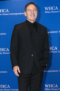 British actor Jason Isaacs poses for photographers as he arrives to the annual White House Correspondents Association Dinner in Washington, Saturday, April 30, 2022. (AP Photo/Jose Luis Magana)