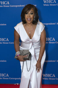 Gayle King poses for photographers as she arrives to the annual White House Correspondents' Association Dinner in Washington, Saturday, April 30, 2022. (AP Photo/Jose Luis Magana)