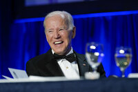 President Joe Biden laughs as he listens to Trevor Noah, host of Comedy Central’s “The Daily Show,” speak at the annual White House Correspondents' Association dinner, Saturday, April 30, 2022, in Washington. (AP Photo/Patrick Semansky)