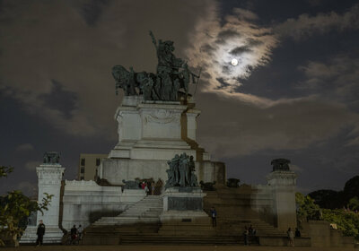 A full moon rises behind the Independence monument in Sao Paulo, Brazil, Sunday, May 15, 2022. (AP Photo/Andre Penner)