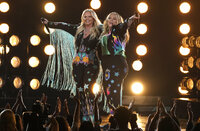 Miranda Lambert, left, and Elle King perform 'Drunk (And I Don't Wanna Go Home)' at the Billboard Music Awards on Sunday, May 15, 2022, at the MGM Grand Garden Arena in Las Vegas. (AP Photo/Chris Pizzello)