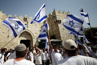 Jerusalem (---), 29/05/2022.- Participants carry Israeli flags during the Israeli right-wing 'Flag March' next to the Damascus gate of Jerusalem's Old City, Jerusalem, 29 May 2022. The annual right-wing Israeli 'Flag March' celebrating the Jerusalem Day has long been viewed by Palestinians as a provocation. Large number of Israeli police forces have been deployed in the Old city of Jerusalem and Palestinian counter protests are expected to take place in the Gaza City and West Bank. (Protestas, Estados Unidos, Damasco, Jerusalén) EFE/EPA/ATEF SAFADI