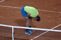 Spain's Rafael Nadal reacts after defeating Serbia's Novak Djokovic during their quarterfinal match of the French Open tennis tournament at the Roland Garros stadium Wednesday, June 1, 2022 in Paris. Nadal won 6-2, 4-6, 6-2, 7-6. (AP Photo/Jean-Francois Badias)