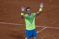 Spain's Rafael Nadal waves to the public after defeating Serbia's Novak Djokovic during their quarterfinal match of the French Open tennis tournament at the Roland Garros stadium Wednesday, June 1, 2022 in Paris. Nadal won 6-2, 4-6, 6-2, 7-6. (AP Photo/Jean-Francois Badias)