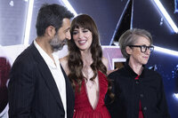 Actors José María Yazpik, from left, Dakota Johnson and filmmaker S. J. Clarkson, pose for photos as they arrive on the red carpet event for their film 'Madame Web' in Mexico City, Tuesday, Feb. 13, 2024. (AP Photo/Marco Ugarte)