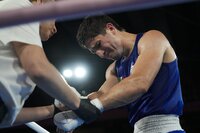 Mexico's Marco Verde reacts after losing to Uzbekistan's Asadkhuja Muydinkhujaev in their men's 71 kg final boxing match at the 2024 Summer Olympics, Friday, Aug. 9, 2024, in Paris, France.(AP Photo/Ariana Cubillos)