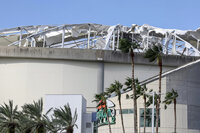 The roof of Tropicana Field was torn off during Hurricane Milton on Thursday, Oct. 10, 2024, in St. Petersburg, Fla. (AP Photo/Mike Carlson)