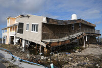 Houses lie in ruins after sustaining tornado and flood damage from Hurricane Milton, Thursday, Oct. 10, 2024, in Matlacha, Fla. (AP Photo/Marta Lavandier)