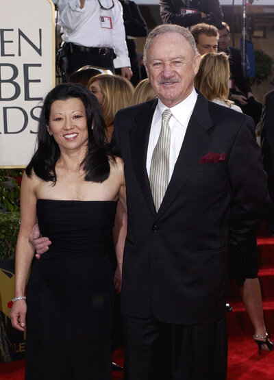 FILE - Actor Gene Hackman arrives with his wife, Betsy Arakawa, for the 60th Annual Golden Globe Awards in Beverly Hills, Calif., Sunday, Jan. 19, 2003. (AP Photo/Mark J. Terrill, File)