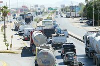 Protestan transportistas en el Periférico, denuncian hostigamiento de la Guardia Nacional