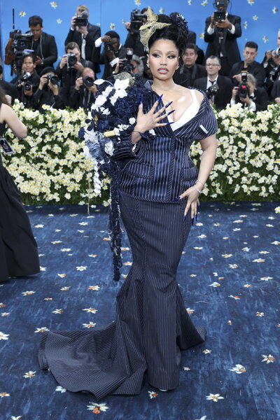 NEW YORK (United States), 06/05/2025.- Trinidadian rapper Nicki Minaj poses on the red carpet for the 2025 Met Gala, the annual benefit for the Metropolitan Museum of Art's Costume Institute, in New York, New York, USA, 05 May 2025. The event coincides with the Met Costume Institute's spring 2025 exhibition ‘Superfine: Tailoring Black Style’ which will be on view from 10 May 2025 through 26 October 2025.  (Nueva York) EFE/EPA/JUSTIN LANE