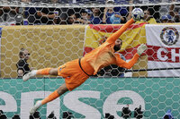 Chelsea's Trevoh Chalobah, left, and Paris Saint-Germain's Lucas Beraldo jump for the ball during the Club World Cup final soccer match between Chelsea and PSG in East Rutherford, N.J., Sunday, July 13, 2025. (AP Photo/Chris Szagola)