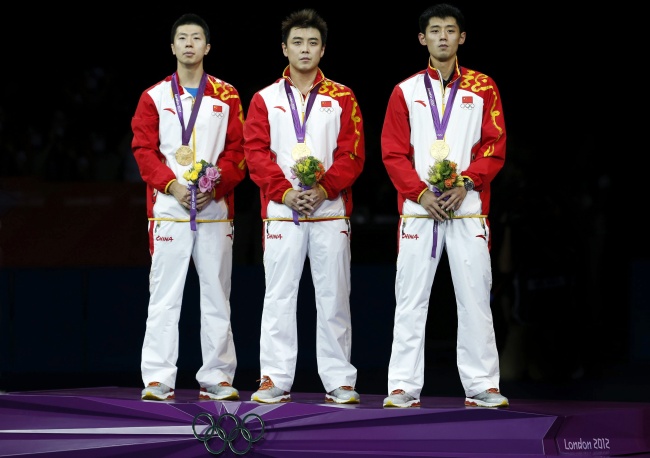 Pese a que hoy se adjudicó cuatro preseas de oro más, Estados Unidos aún no puede dar alcance a China en la cima de la tabla de medallas de los Juegos Olímpicos Londres 2012. (EFE)