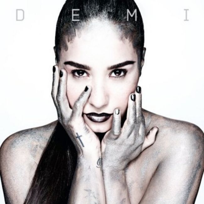Cambio. En la portada de su nuevo disco, Demi muestra una imagen muy alejada de aquel 'look' infantil que lució en Disney.