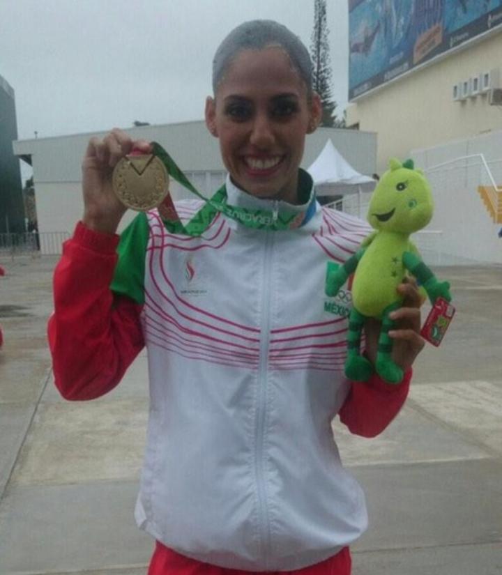 La nadadora de sincronizado Nuria Diosdado alcanzó su sexto oro en Juegos Centroamericanos y del Caribe de Veracruz 2014 al llevarse la prueba de dueto libre. (@CONADE)