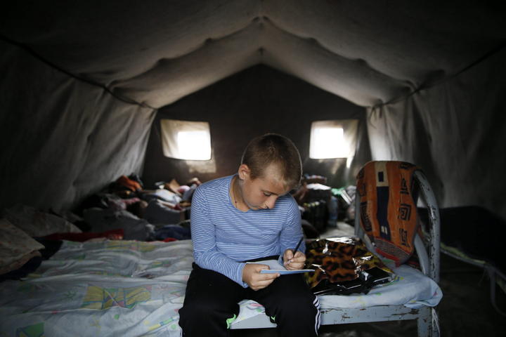 El conflicto violento que se registra en el este de Ucrania afecta a un millón 700 mil niños, por lo que se requiere 32 millones de dólares para asistir a los menores. (ARCHIVO)
