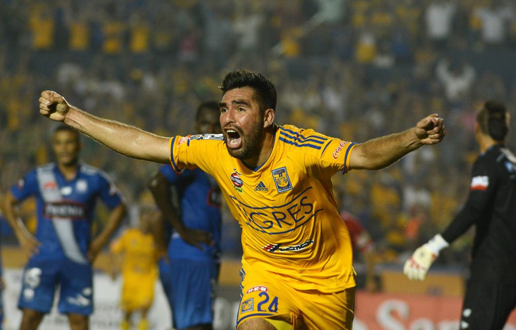 'La Palmera' Rivas celebra el gol anotado al minuto 79 con el que los Tigres de la UANL derrotaron 2-0 a Emelec de Ecuador. (EFE)