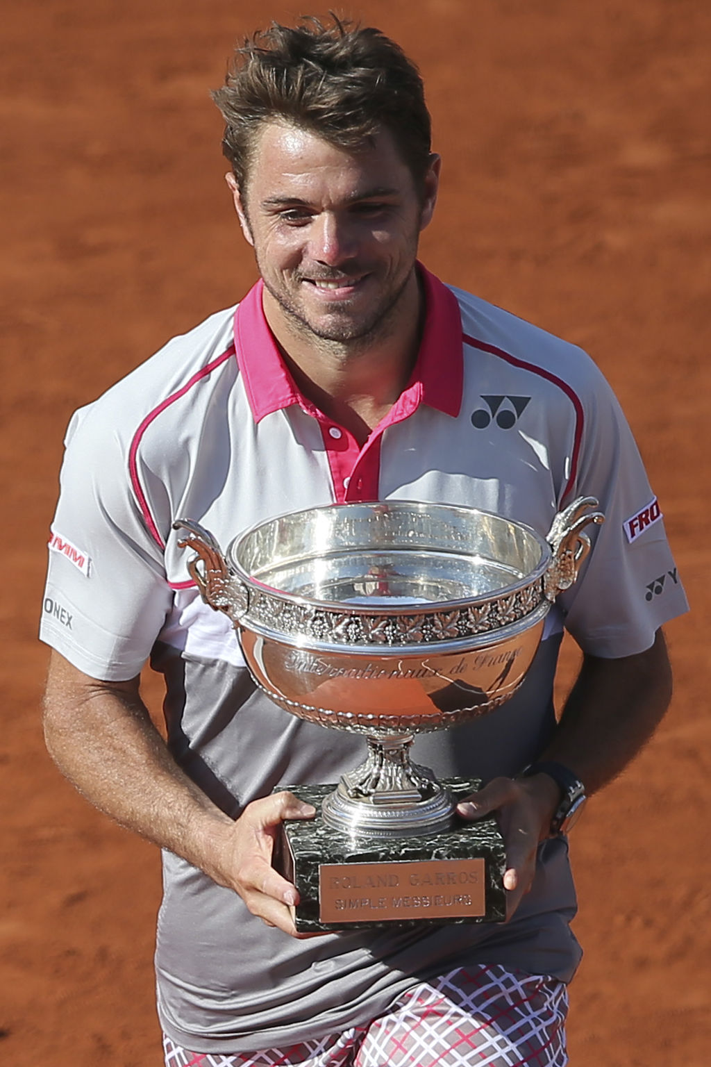 El suizo Stanislas Wawrinka consiguió su segundo título de grand slam al vencer al serbio Novak Djokovic en cuatro sets. (EFE)