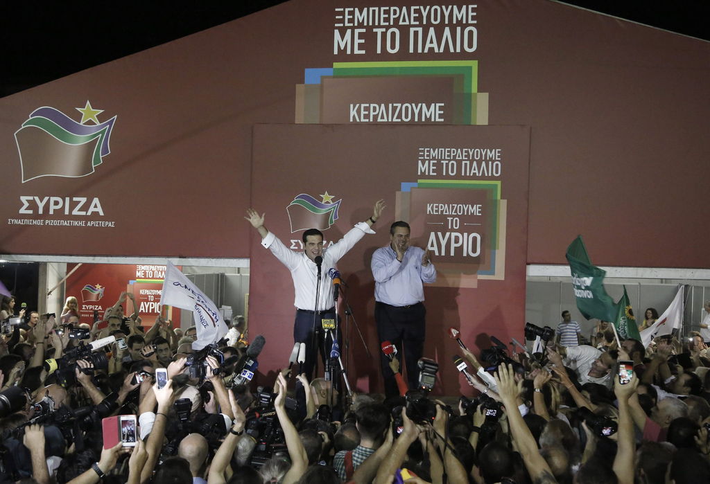 Grecia. En la imagen se observa a Tsipras  junto a Panos Kammenos celebrando el primer triunfo.
