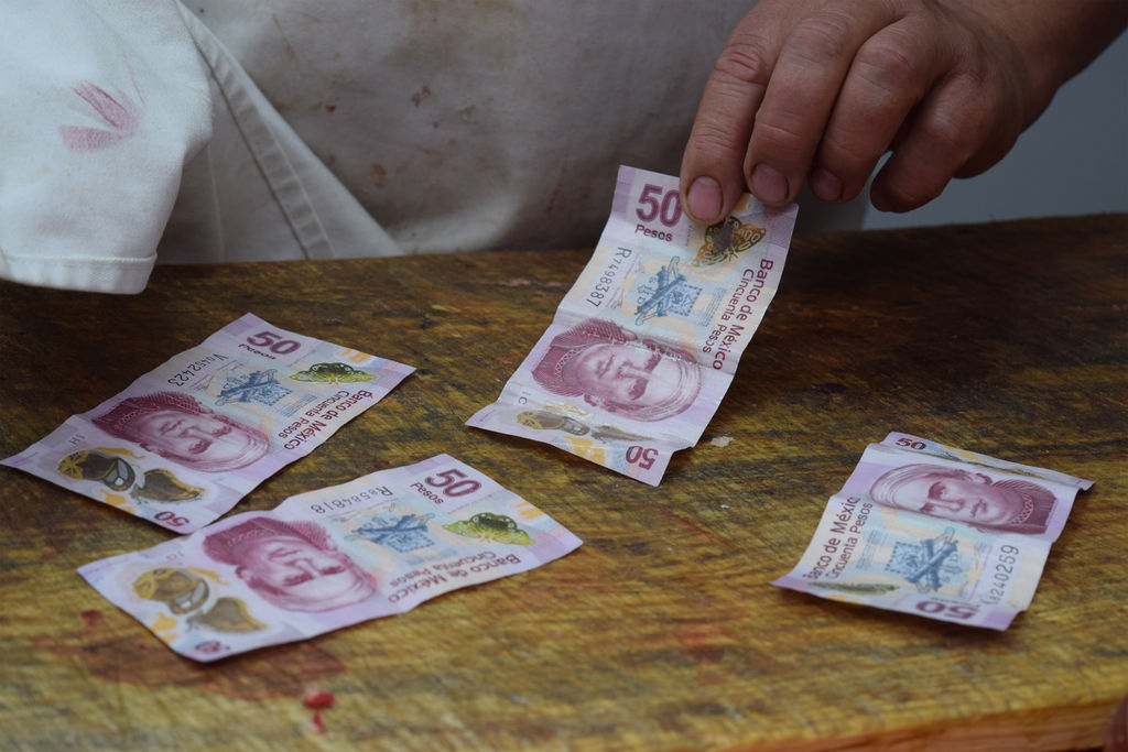 Billetes. Erróneamente, entre los comerciantes se difundió que circulaban billetes de 50 pesos falsos.