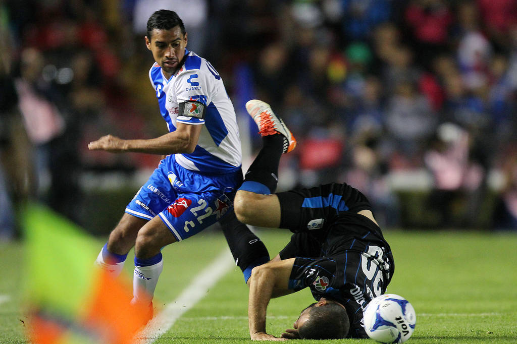 El dramático empate en el estadio La Corregidora (0-0) convirtió al Puebla en el sexto clasificado a la Liguilla. (Jam Media)