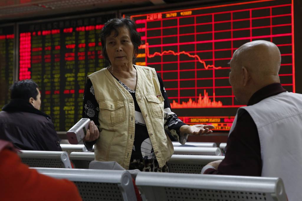 Mundo. Los resultados bursátiles en el mundo fueron mixtos, mientras que Shanghái cayó 5.32 por ciento. (EFE)