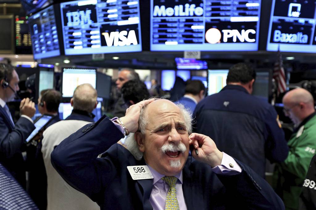 En rojo. Una jornada de alta volatilidad generó que Wall Street terminara en números rojos. (EFE)