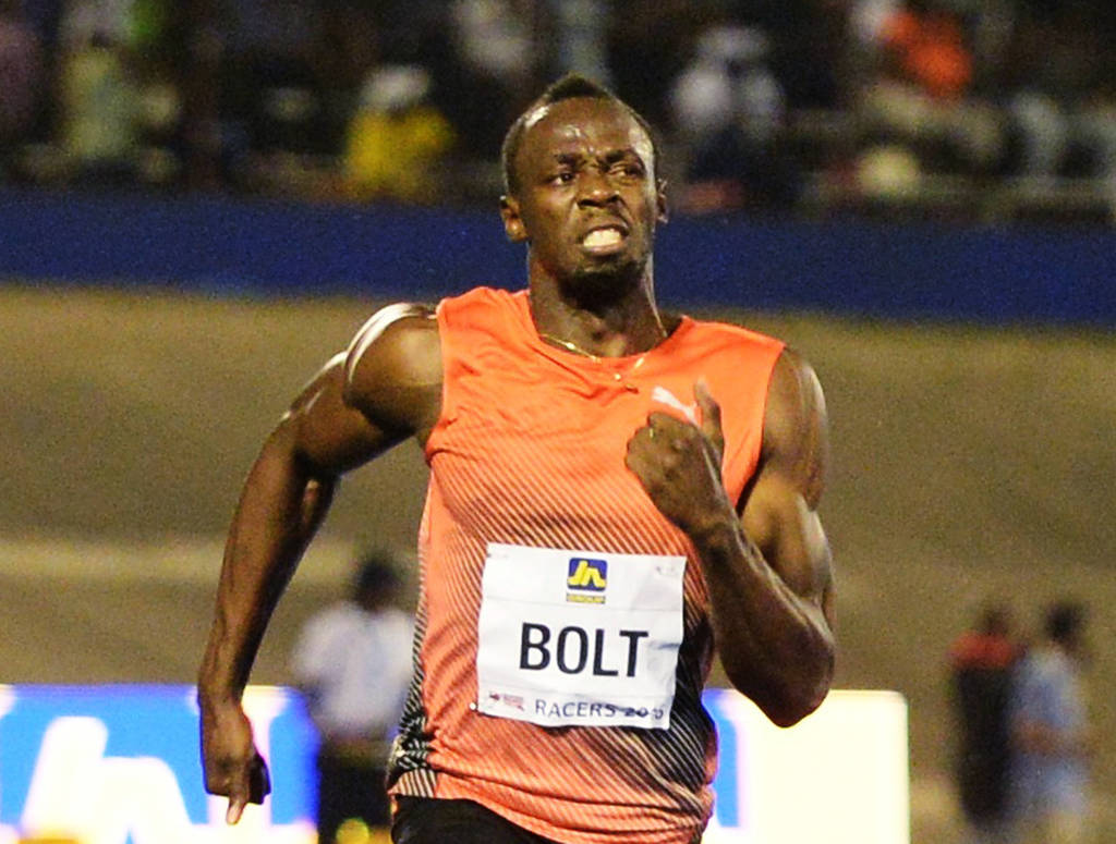 El jamaicano Usain Bolt toma el relevo hoy cuando se presente por primera vez en la moderna pista azul del estadio Enganhao, Brasil. (Archivo)