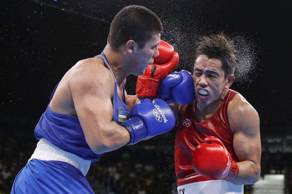 El uzbeko Bektimir Belikuziev fue superior al mexicano Misael Espinoza en batalla por el pase a la final en el peso medio. (EFE)